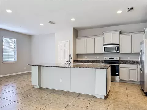 Kitchen - 6307 Pin Cherry Pl, Riverview, FL 33578 photo 7 of 7