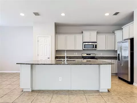 Kitchen - 6307 Pin Cherry Pl, Riverview, FL 33578 photo 2 of 7