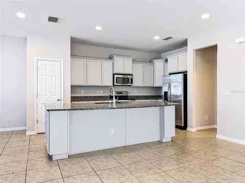Kitchen - 6307 Pin Cherry Pl, Riverview, FL 33578 photo 6 of 7