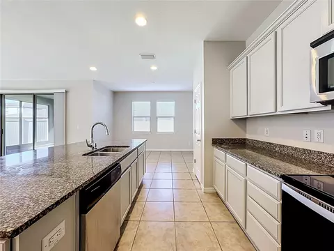 Kitchen - 6307 Pin Cherry Pl, Riverview, FL 33578 photo 5 of 7