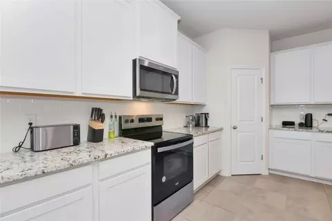 Kitchen - 627 160th St E, Bradenton, FL 34212 photo 6 of 7