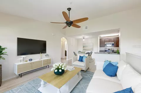 Living - 8911 Manor Loop #207, Lakewood Ranch, FL 34202 photo 8 of 11