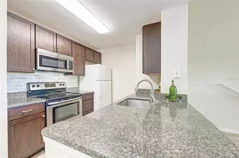 Kitchen - 8911 Manor Loop #207, Lakewood Ranch, FL 34202 photo 3 of 5