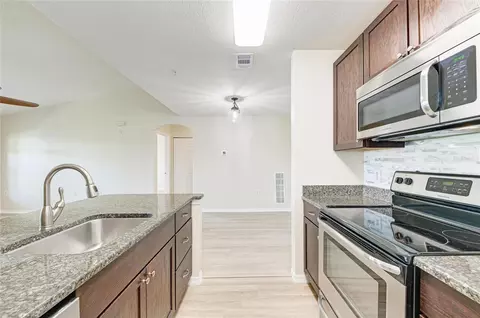 Kitchen - 8911 Manor Loop #207, Lakewood Ranch, FL 34202 photo 5 of 5