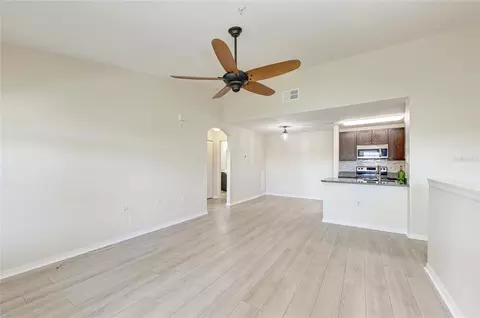 Living - 8911 Manor Loop #207, Lakewood Ranch, FL 34202 photo 7 of 11