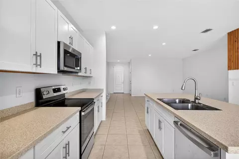 Kitchen - 8667 Canyon Creek Trl, Parrish, FL 34219 photo 2 of 3