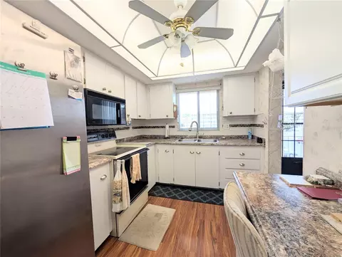Kitchen - 3624 Lake Bayshore Dr #K-303, Bradenton, FL 34205 photo 1 of 2