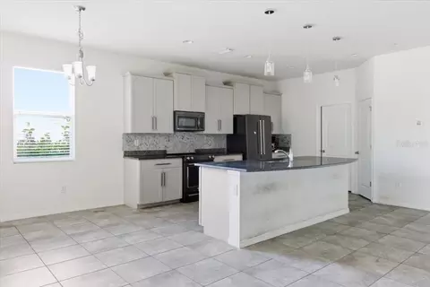 Kitchen - 6702 Devesta Loop, Palmetto, FL 34221 photo 2 of 2