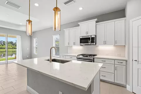 Kitchen - 3714 Woodmont Dr, Parrish, FL 34219 photo 2 of 8