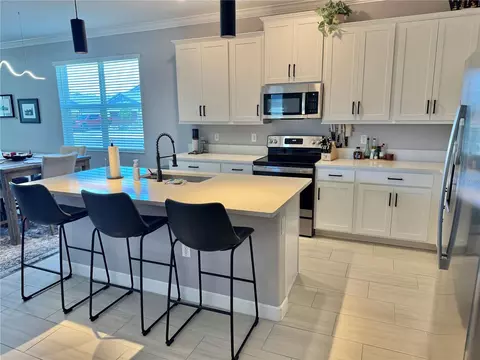 Kitchen - 12842 Lily Quartz Loop, Parrish, FL 34219 photo 3 of 4