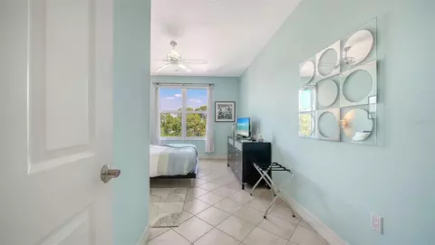 Bedroom - 409 N Point Rd #401, Osprey, FL 34229 photo 5 of 10