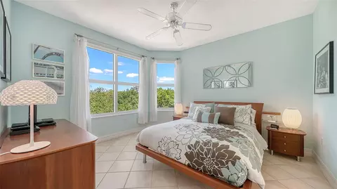 Bedroom - 409 N Point Rd #401, Osprey, FL 34229 photo 8 of 10