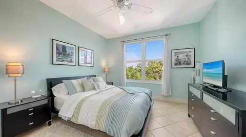 Bedroom - 409 N Point Rd #401, Osprey, FL 34229 photo 6 of 10