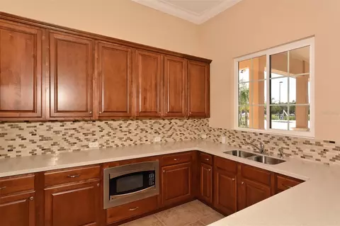 Kitchen - 12554 Cara Cara Loop, Bradenton, FL 34212 photo 6 of 6