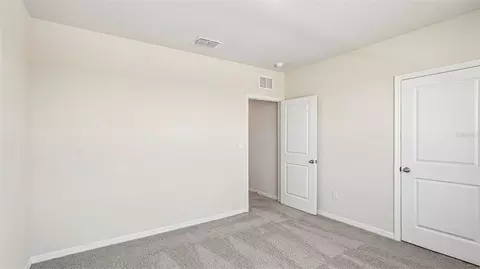 Bedroom - 10923 Rabbit Grove Trl, Parrish, FL 34219 photo 14 of 16