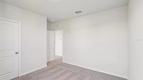 Bedroom - 10923 Rabbit Grove Trl, Parrish, FL 34219 photo 13 of 16