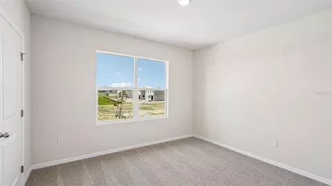 Bedroom - 10923 Rabbit Grove Trl, Parrish, FL 34219 photo 11 of 16