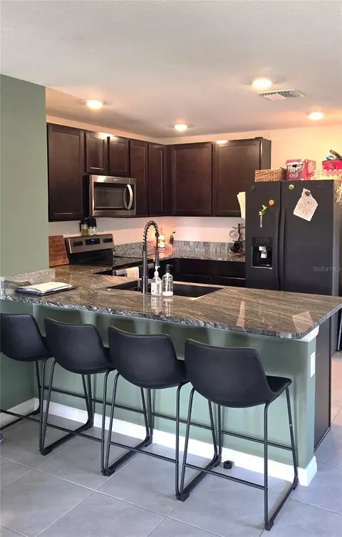 Kitchen - 16731 Kingman Reef St, Wimauma, FL 33598 photo 2 of 2