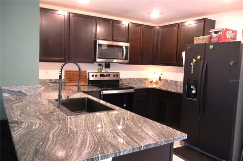 Kitchen - 16731 Kingman Reef St, Wimauma, FL 33598 photo 1 of 2
