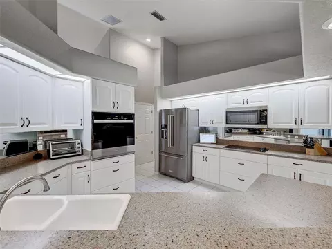 Kitchen - 1303 E Gate Dr, Venice, FL 34285 photo 5 of 9