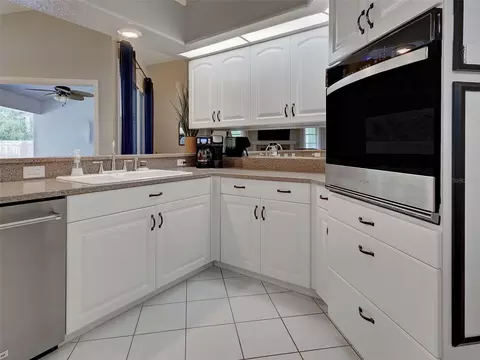 Kitchen - 1303 E Gate Dr, Venice, FL 34285 photo 3 of 9