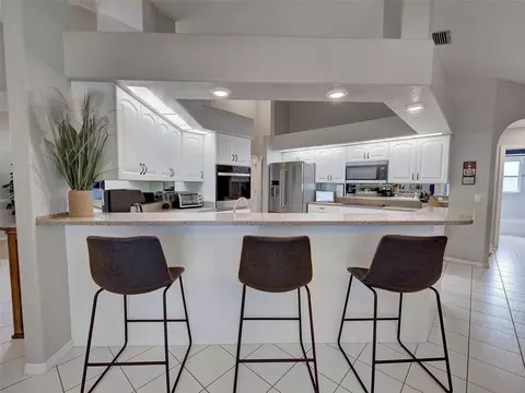 Kitchen - 1303 E Gate Dr, Venice, FL 34285 photo 8 of 9