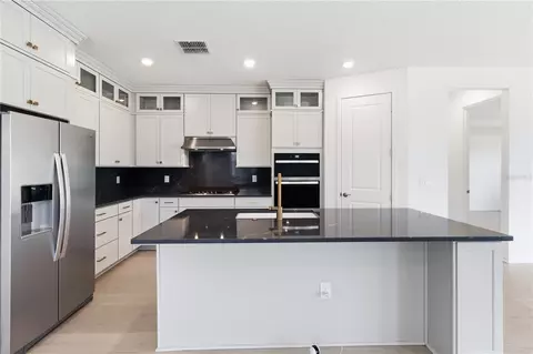 Kitchen - 13824 Sunlight Meadow Dr, Riverview, FL 33578 photo 3 of 3