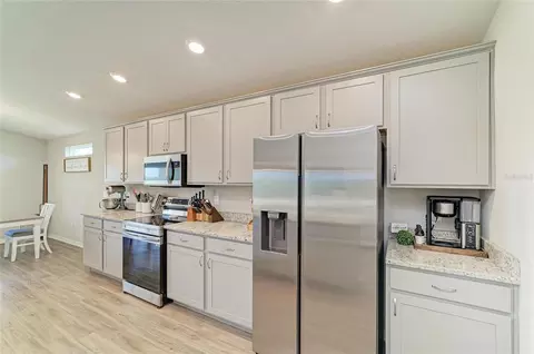Kitchen - 6704 162nd Pl E, Parrish, FL 34219 photo 2 of 6