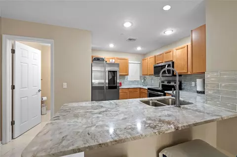 Kitchen - 8825 White Sage Loop, Lakewood Ranch, FL 34202 photo 3 of 5