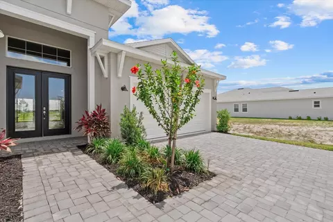 Exterior - 8668 Salmar Loop, Parrish, FL 34219 photo 4 of 11