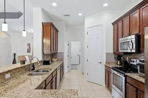 Kitchen - 12903 49th Ln E, Parrish, FL 34219 photo 4 of 7