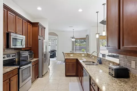 Kitchen - 12903 49th Ln E, Parrish, FL 34219 photo 5 of 7