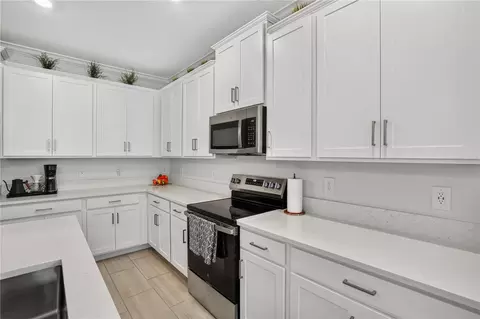 Kitchen - 12617 Lily Quartz Loop, Parrish, FL 34219 photo 6 of 6