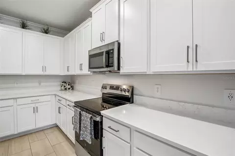 Kitchen - 12617 Lily Quartz Loop, Parrish, FL 34219 photo 5 of 6