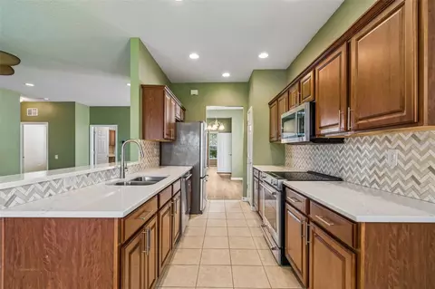Kitchen - 10448 48th Ct E, Parrish, FL 34219 photo 2 of 4