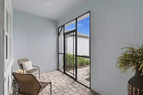 Exterior - 9350 Ballaster Pointe Loop, Parrish, FL 34219 photo 4 of 13