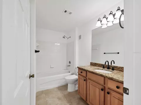 Bath - 8933 Manor Loop #105, Bradenton, FL 34202 photo 1 of 2