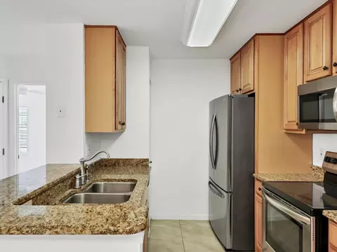 Kitchen - 8933 Manor Loop #105, Bradenton, FL 34202 photo 1 of 4