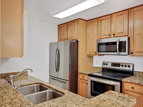 Kitchen - 8933 Manor Loop #105, Bradenton, FL 34202 photo 2 of 4
