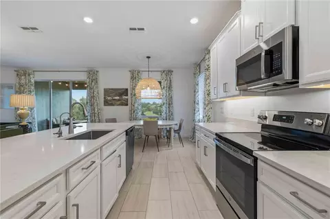 Kitchen - 14325 17th Ct E, Parrish, FL 34219 photo 4 of 5