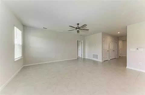 Living - 10855 Daybreak Gln, Parrish, FL 34219 photo 4 of 5