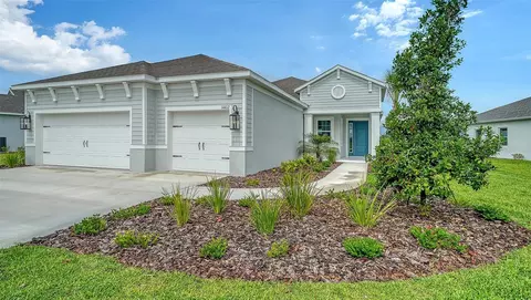 Exterior - 14412 Skipping Stone Loop, Parrish, FL 34219 photo 2 of 9