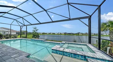 Exterior - 14412 Skipping Stone Loop, Parrish, FL 34219 photo 5 of 9