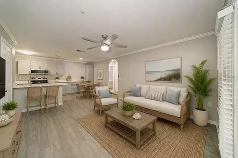 Living - 8932 Manor Loop #102, Bradenton, FL 34202 photo 1 of 8