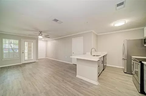 Living - 8932 Manor Loop #102, Bradenton, FL 34202 photo 7 of 8