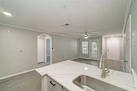 Kitchen - 8932 Manor Loop #102, Bradenton, FL 34202 photo 8 of 8