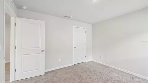 Bedroom - 17516 Whiskey Creek Trl, Parrish, FL 34219 photo 11 of 14