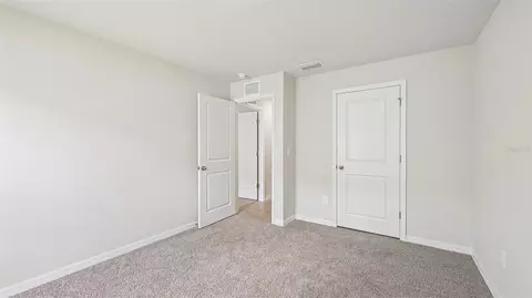 Bedroom - 17516 Whiskey Creek Trl, Parrish, FL 34219 photo 5 of 14