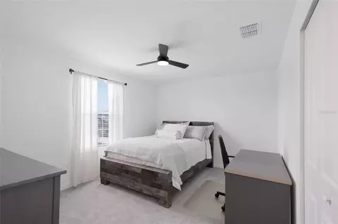 Bedroom - 8732 Sunset Park Trl, Parrish, FL 34219 photo 8 of 9