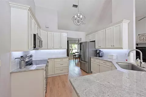 Kitchen - 305 Mill Run E, Bradenton, FL 34212 photo 1 of 2